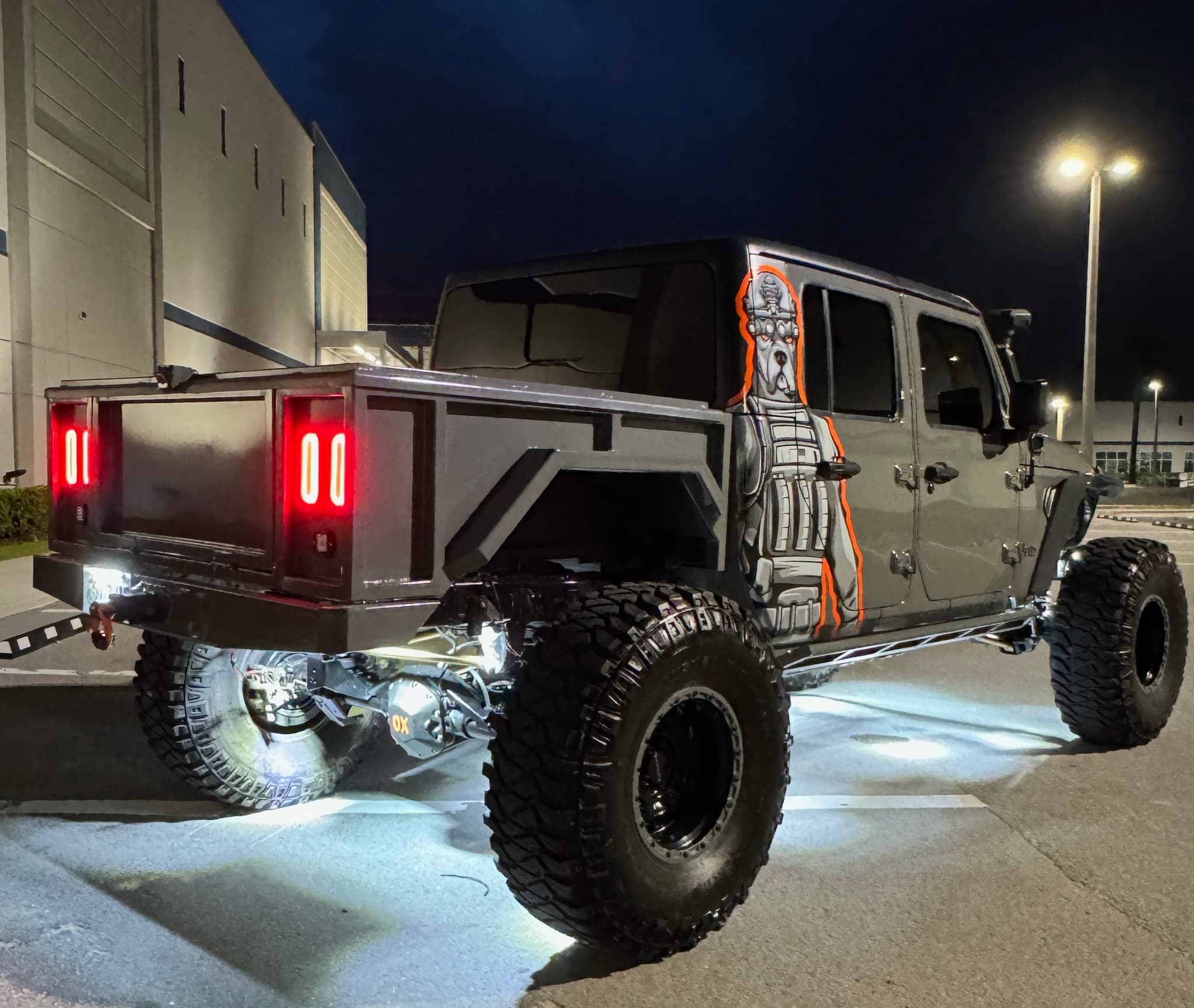 A War Dog build lit up at night